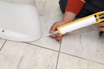 A bathroom toilet replacement in a residential home.